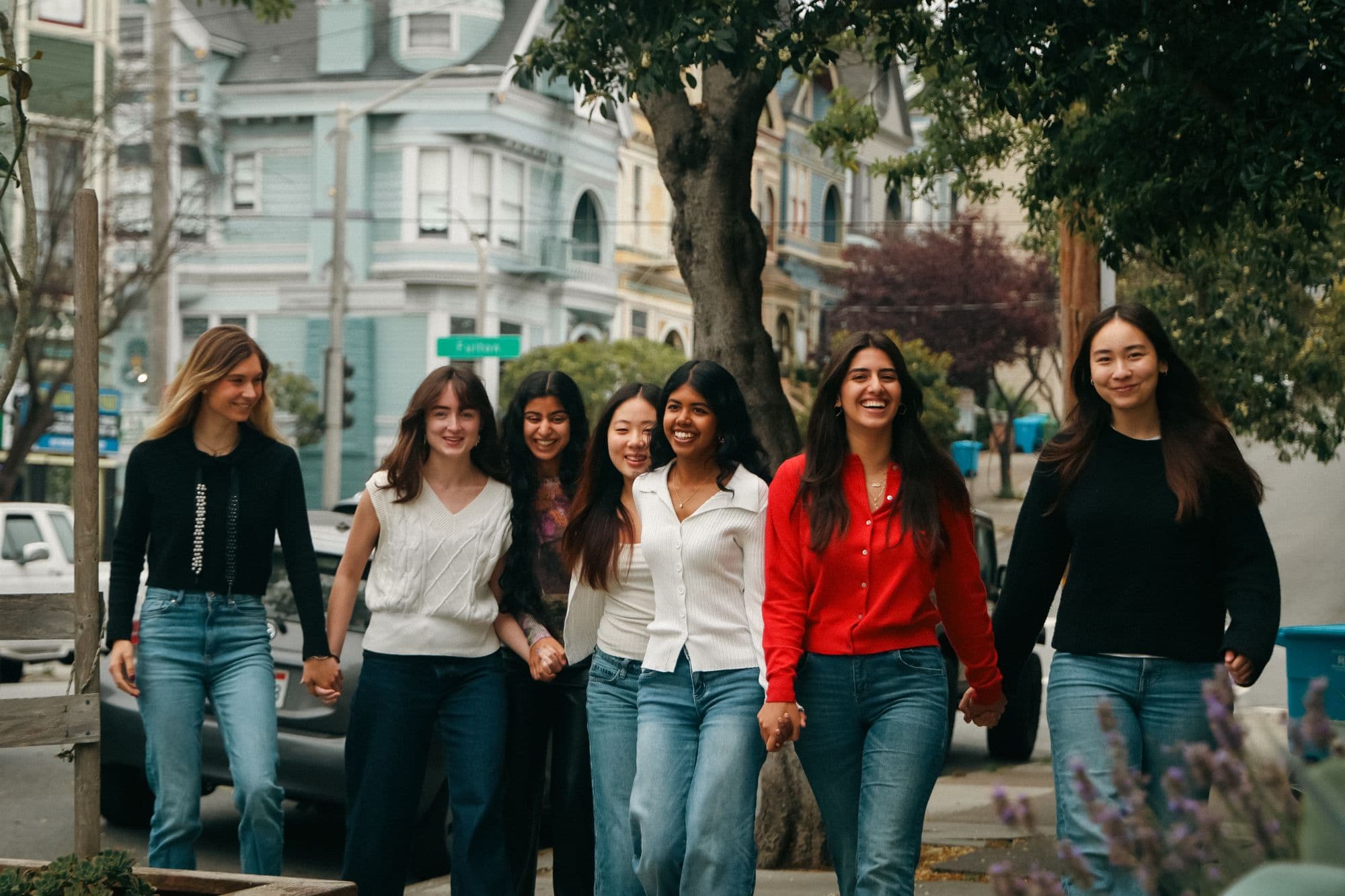 FoundHer House residents walking hand in hand through San Francisco